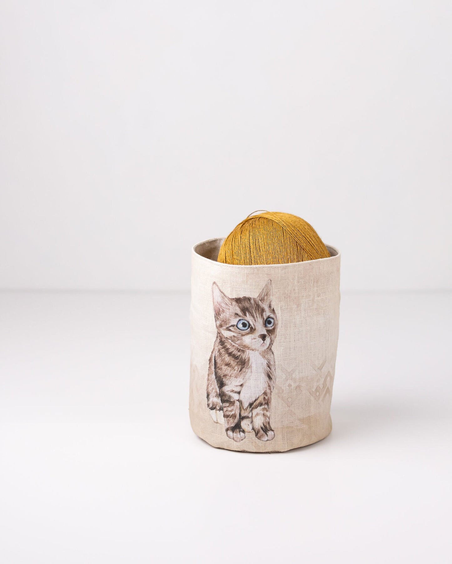 Linen basket bin for storage with cat