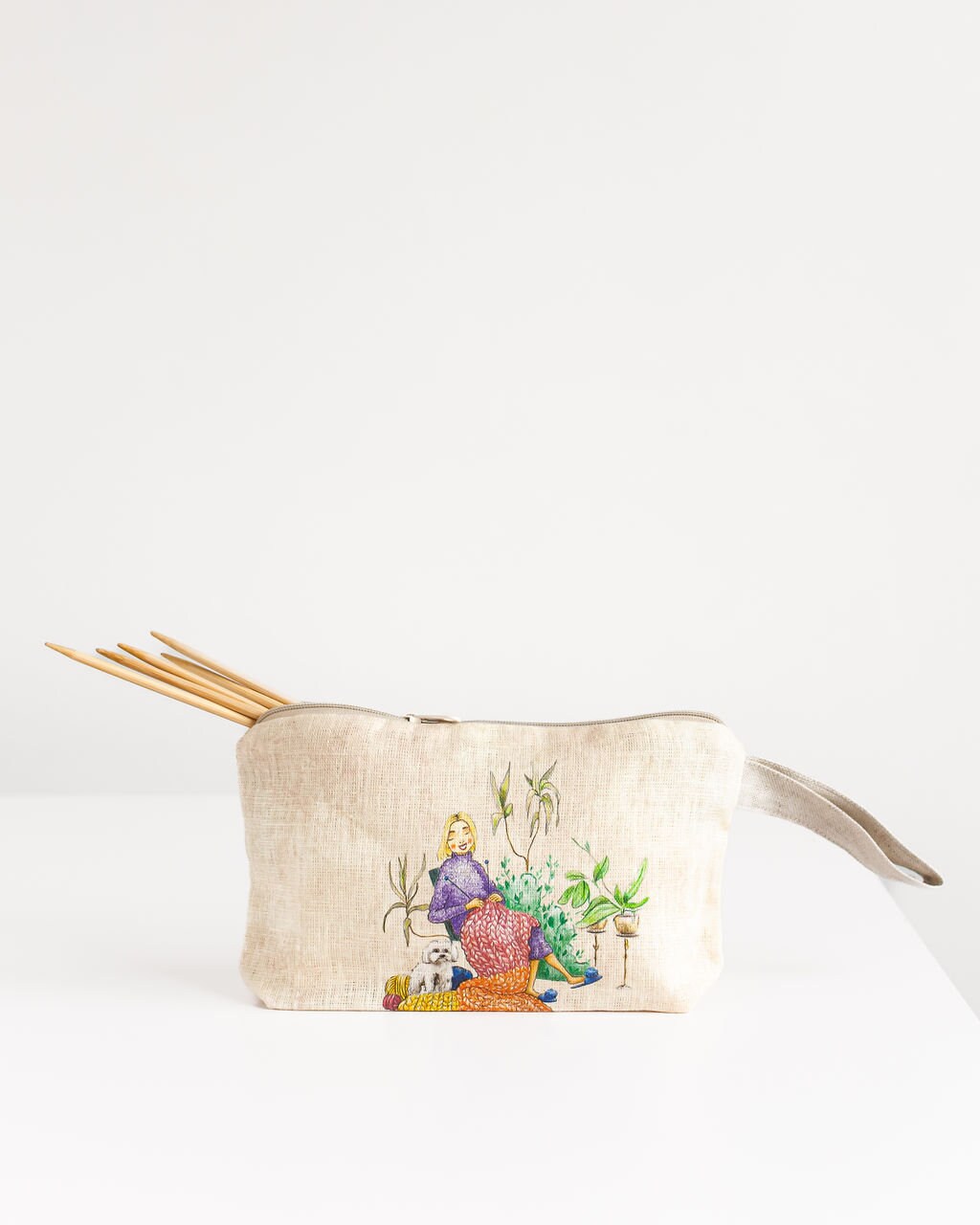 Wristlet pouch with knitter picture print on linen fabric, zipped pencil case