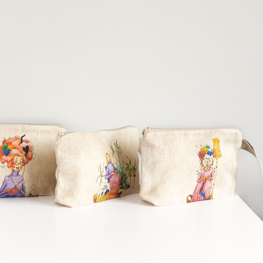 Wristlet pouch with knitter picture print on linen fabric. Cosmetic bag, glasses case.