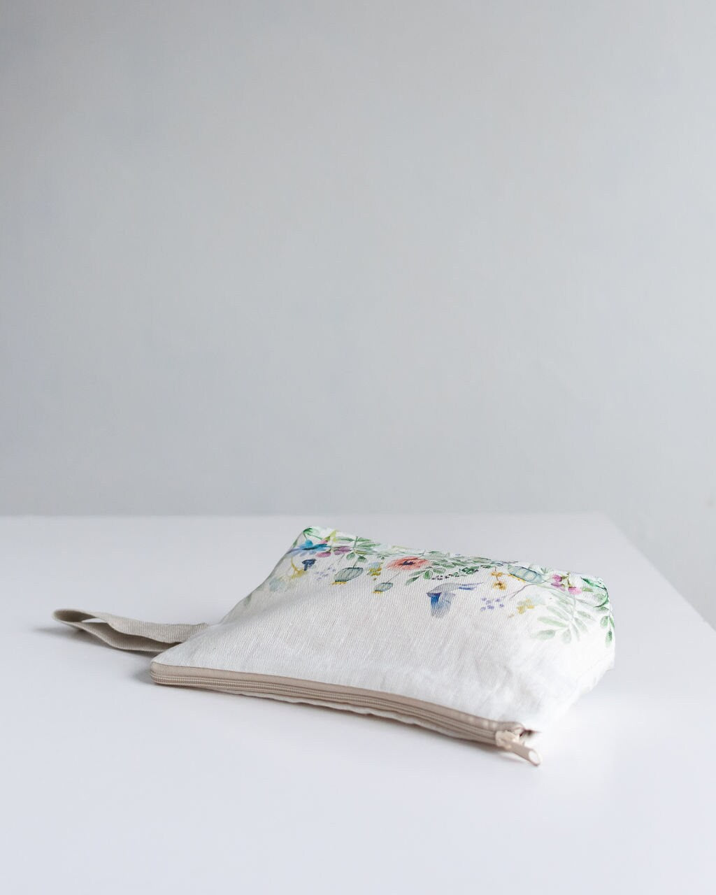 Meadow print wristlet pouch from linen fabric