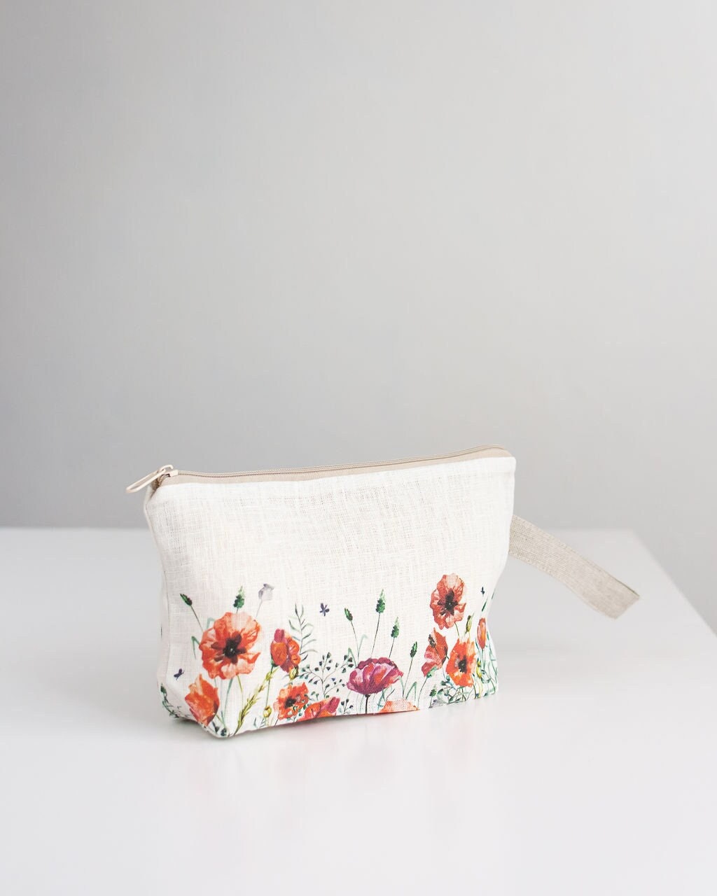 Poppy print wristlet pouch from linen fabric