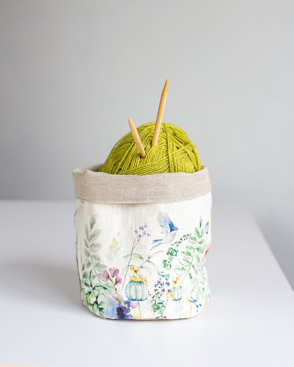 Storage basket with meadow print.
