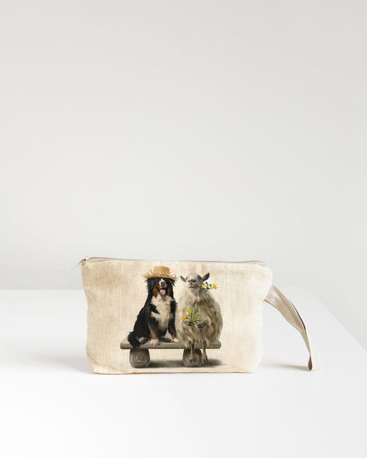 Linen Wristlet pouch with sheep and dog print.