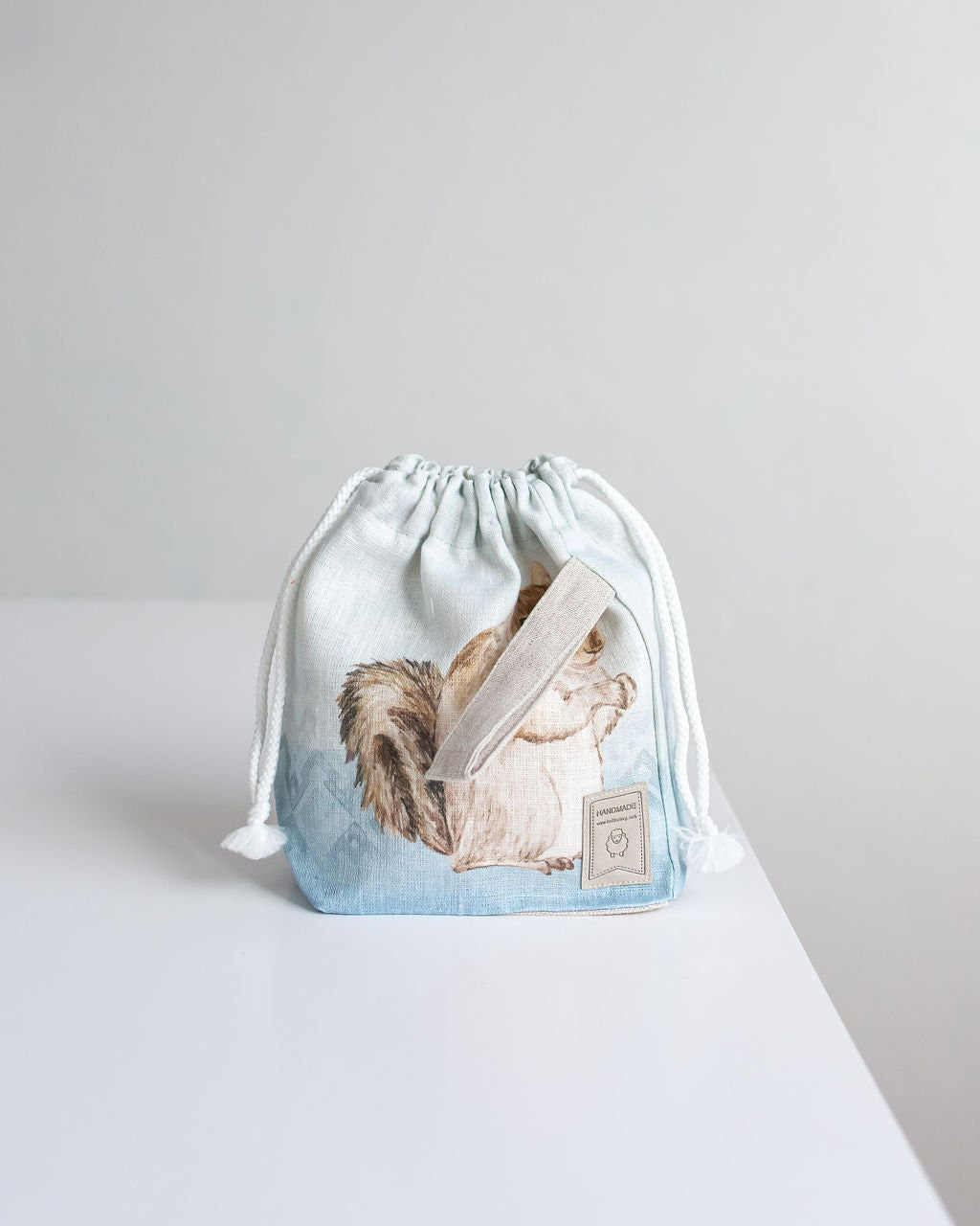 Small WIP Project Bag with Knitter with Squirrel print and blue background