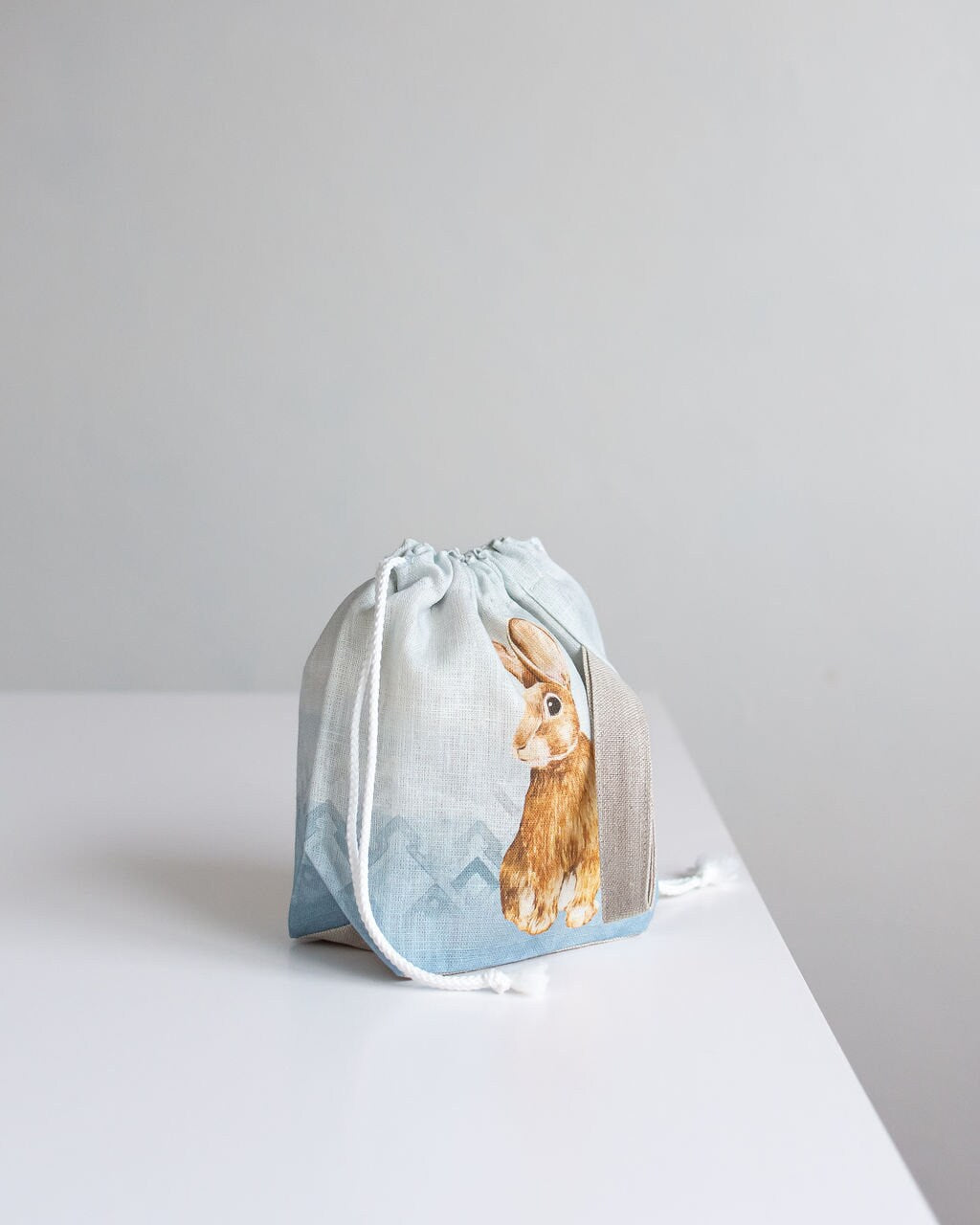 WIP Project Bag with Knitter with Bunny print and blue background