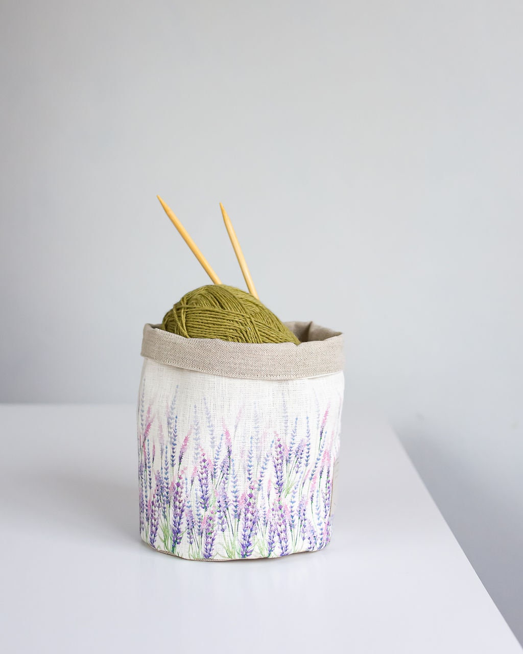 Storage basket with lavender print.