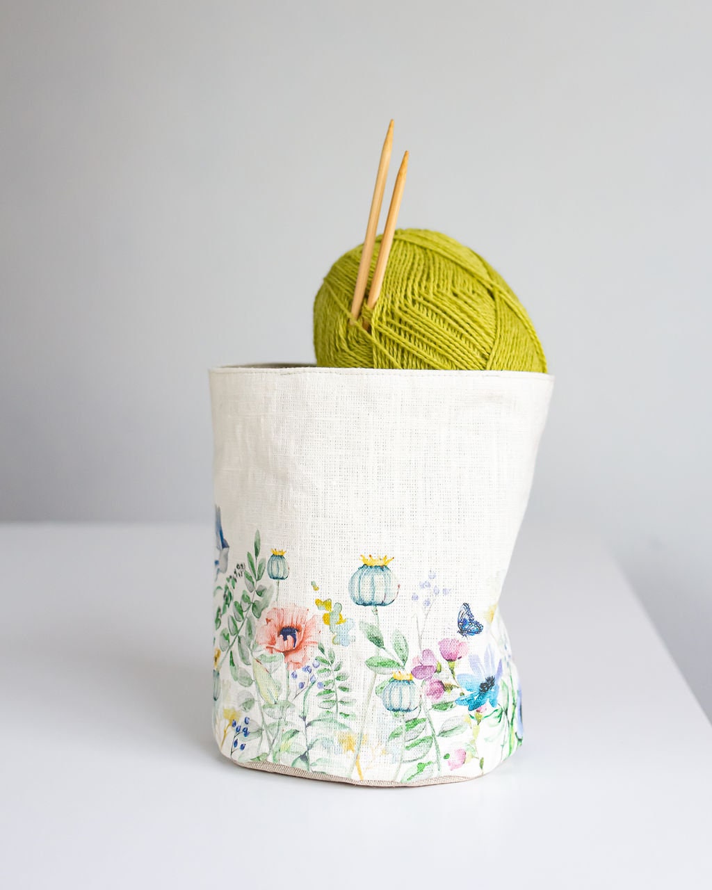 Storage basket with meadow print.